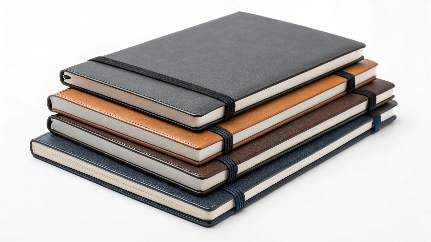 alt with keywords: Stack of wholesale custom A5 PU leather notebooks ready for distribution