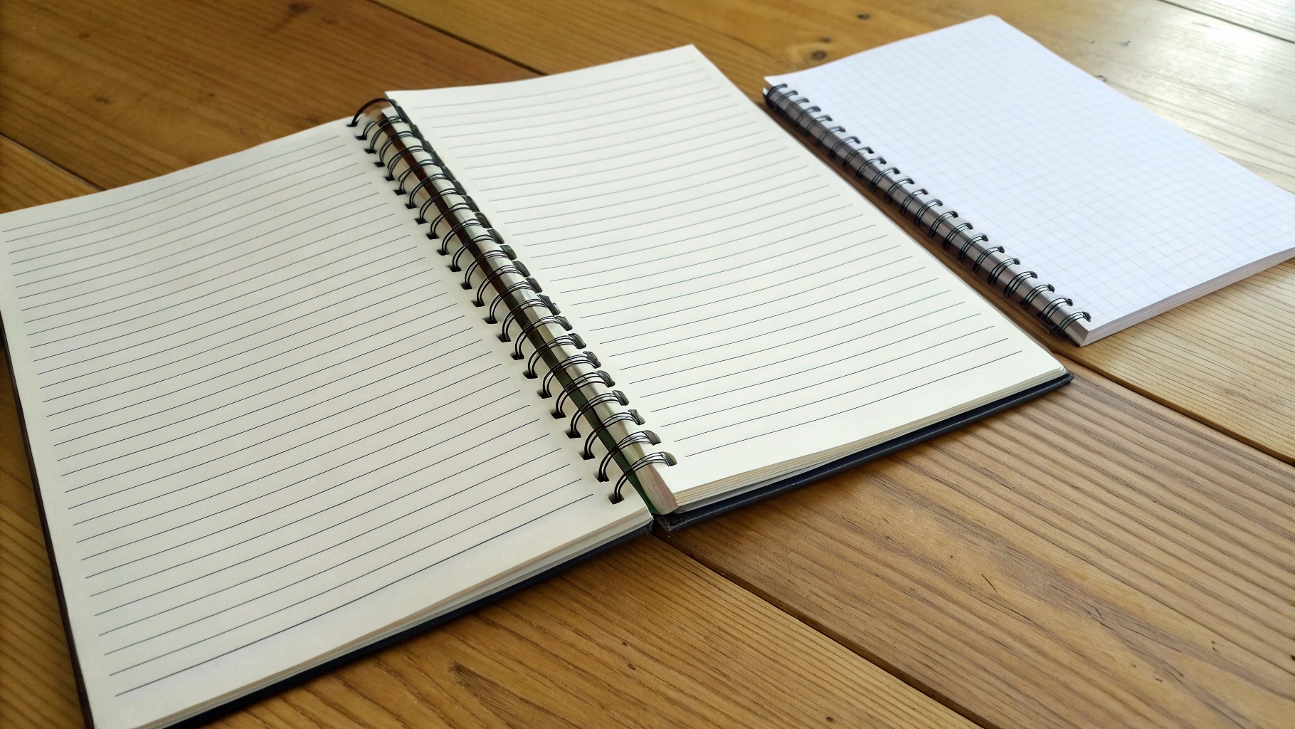 Side-by-side comparison of an A4 and A5 notebook